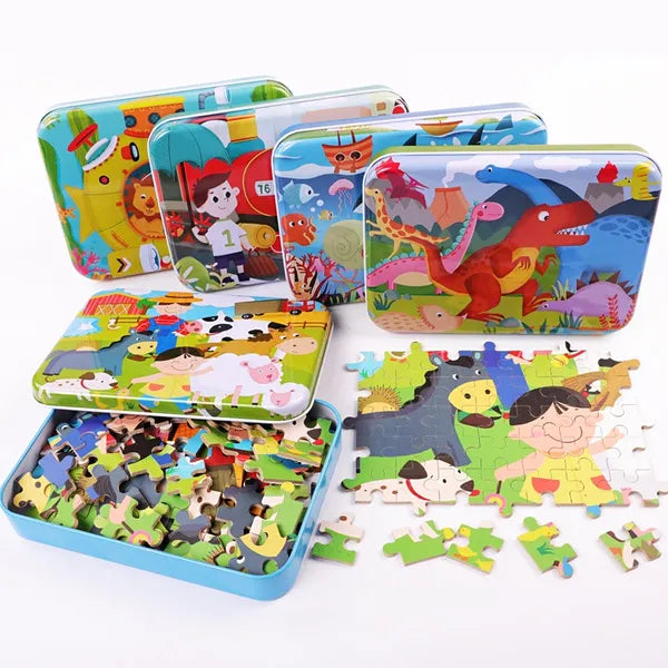 Set of colorful children's puzzles in tins with various designs on a white background
