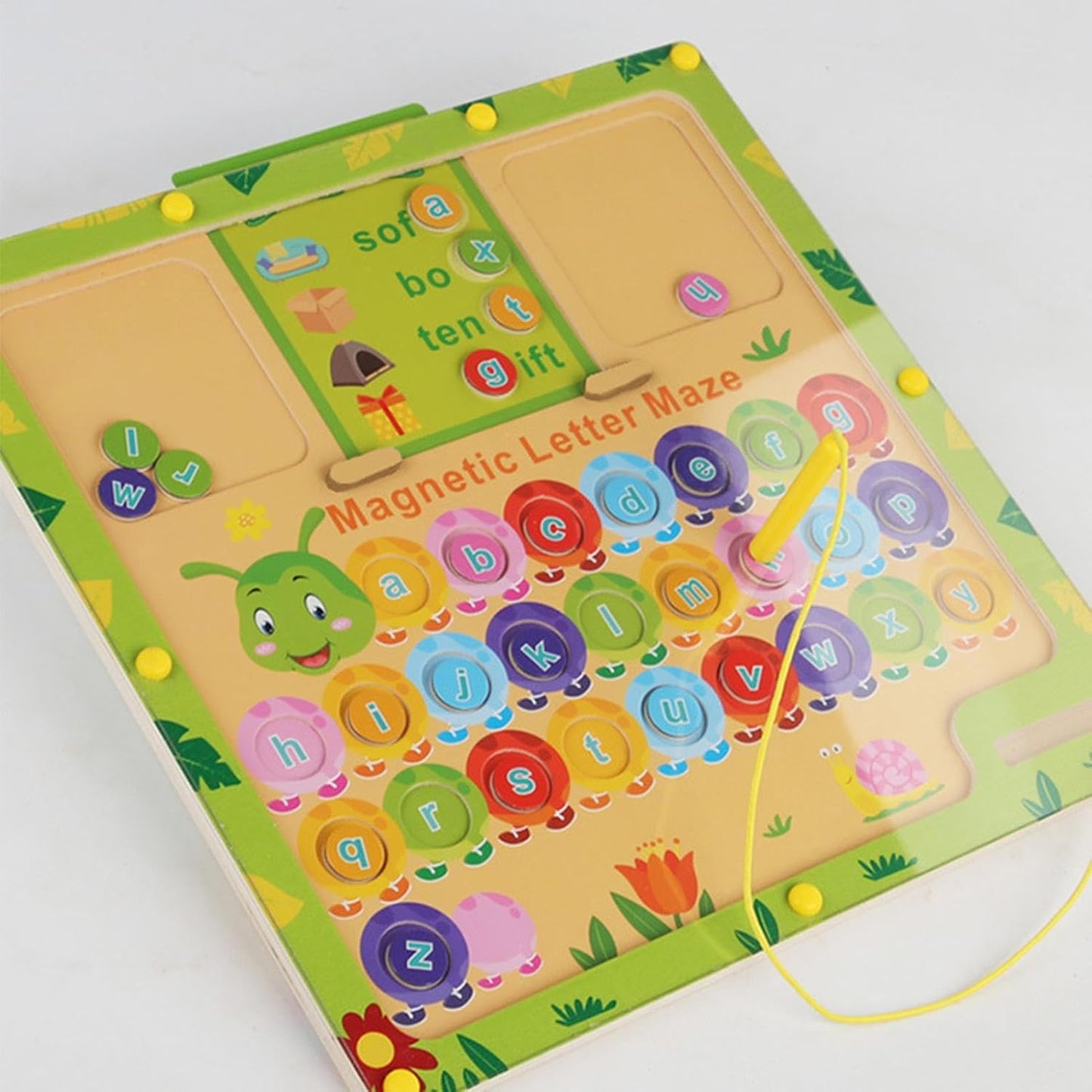 Colorful magnetic letter maze toy with alphabet letters on a white background