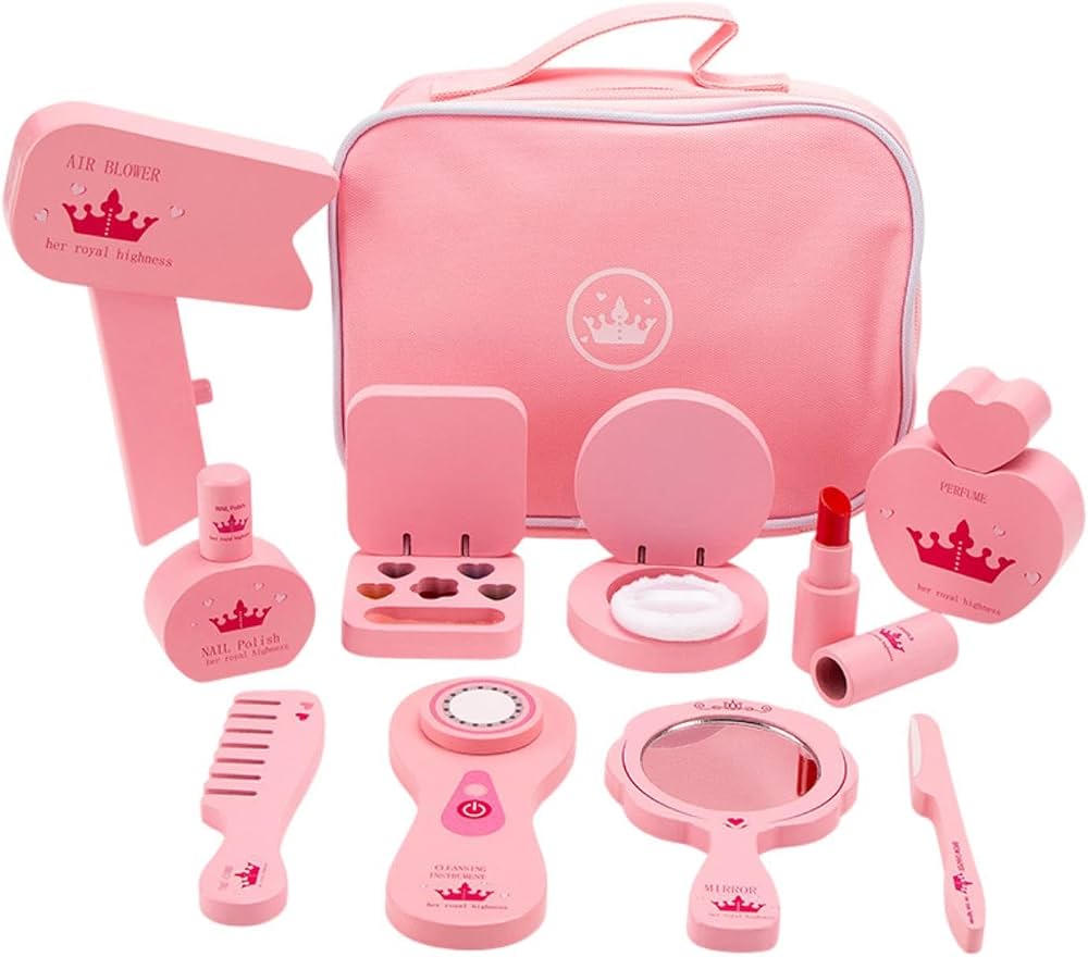 Pink toy makeup set with various accessories on a white background